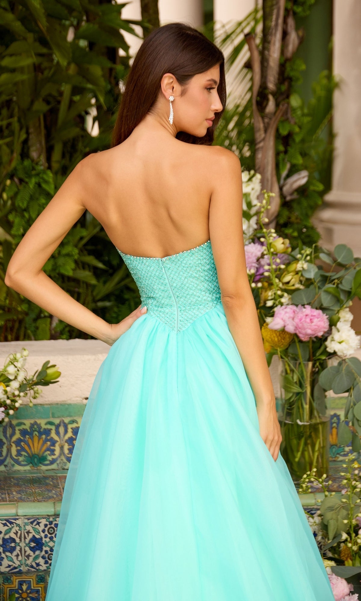 Mint green strapless Ava Presley 47424 ball gown featuring a beaded bodice and a full tulle skirt.